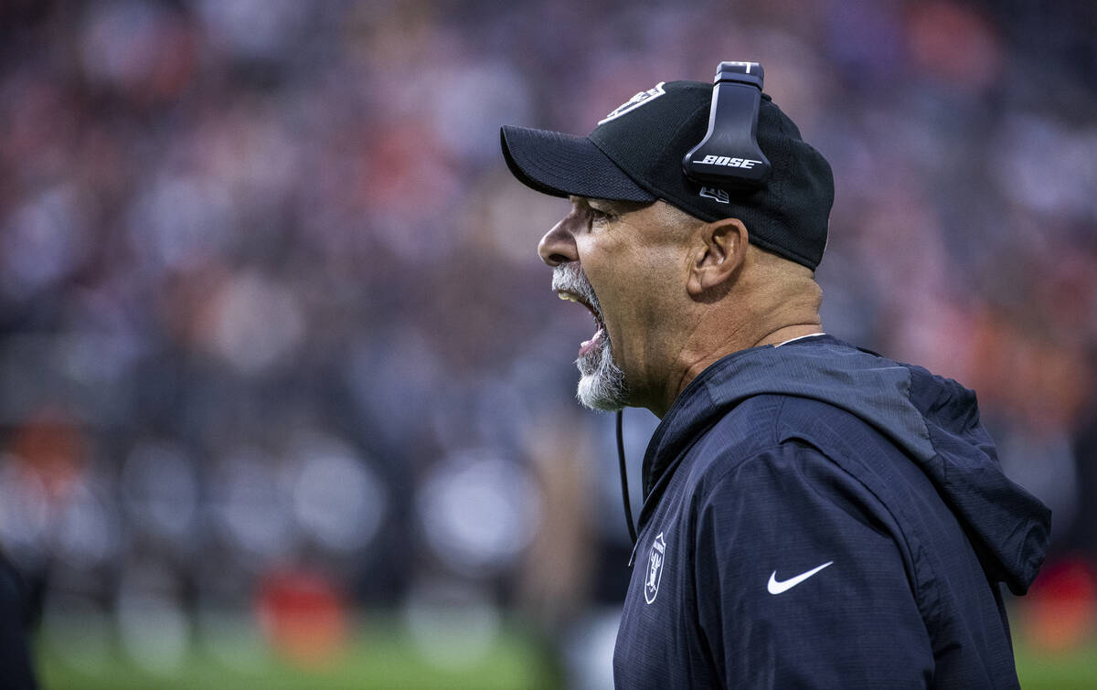 Raiders interim head coach Rich Bisaccia yells at his team versus the Denver Broncos during the ...