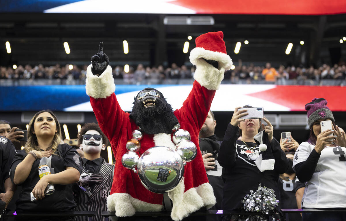 Raiders fans during an NFL football game against the Denver Broncos on Sunday, Dec. 26, 2021, a ...