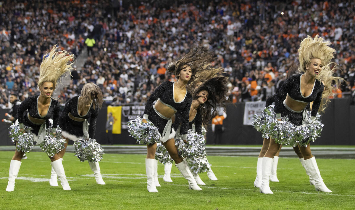 The Raiderettes perform in the second half of an NFL football game against the Denver Broncos o ...