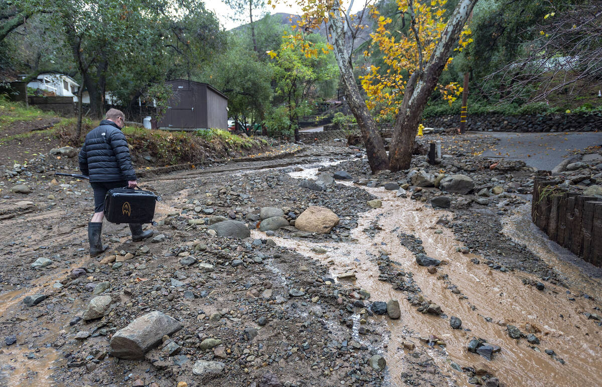 David Hunt, of Silverado Canyon, walks along Grundy Way at the intersection of Water Way in Sil ...