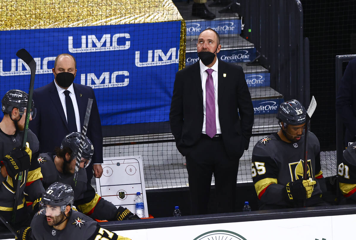 Golden Knights head coach Pete DeBoer looks on during the first period of Game 2 in an NHL hock ...