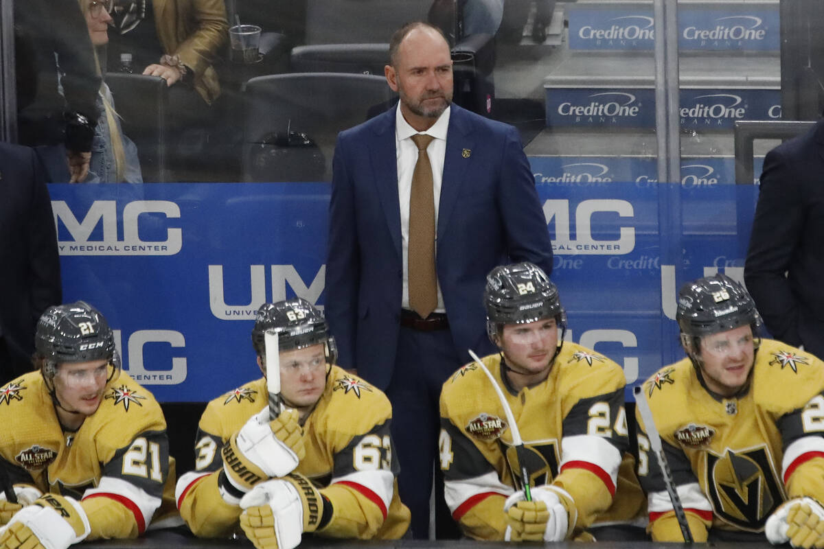 Golden Knights coach Pete DeBoer watch his players during the third period of an NHL hockey gam ...