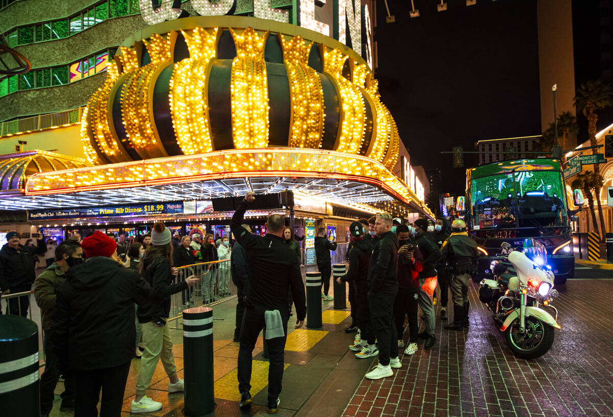 Arizona State players arrive for a welcome reception at the Fremont Street Experience ahead of ...
