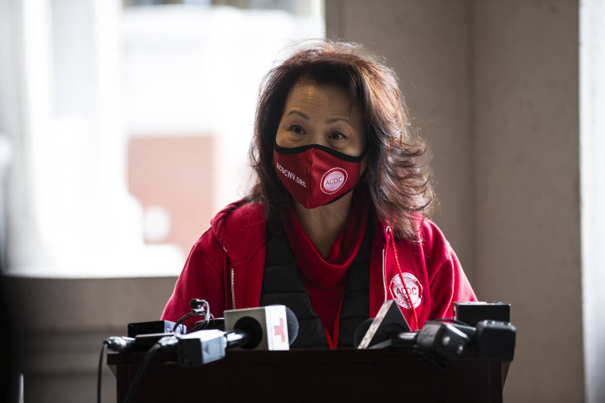 Vida Lin, president of the Asian Community Development Council, speaks during a press conferenc ...
