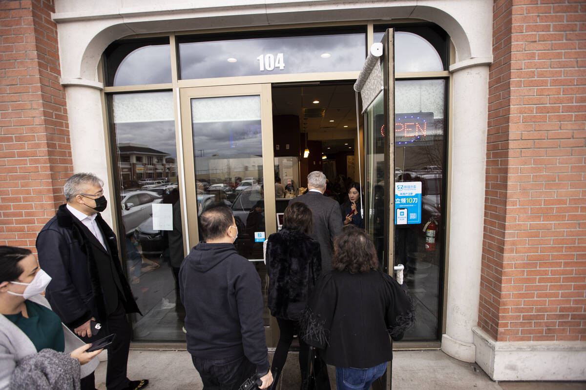 Gov. Steve Sisolak visits ShangHai Taste, a restaurant where a waiter was shot 11 times in an a ...