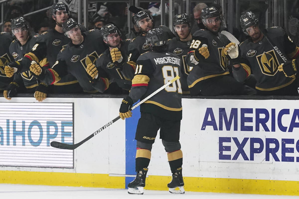 Vegas Golden Knights center Jonathan Marchessault (81) is congratulated after scoring during th ...