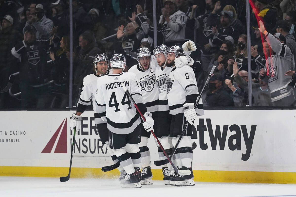 Los Angeles Kings celebrate after center Adrian Kempe (9) scored a goal during the first period ...