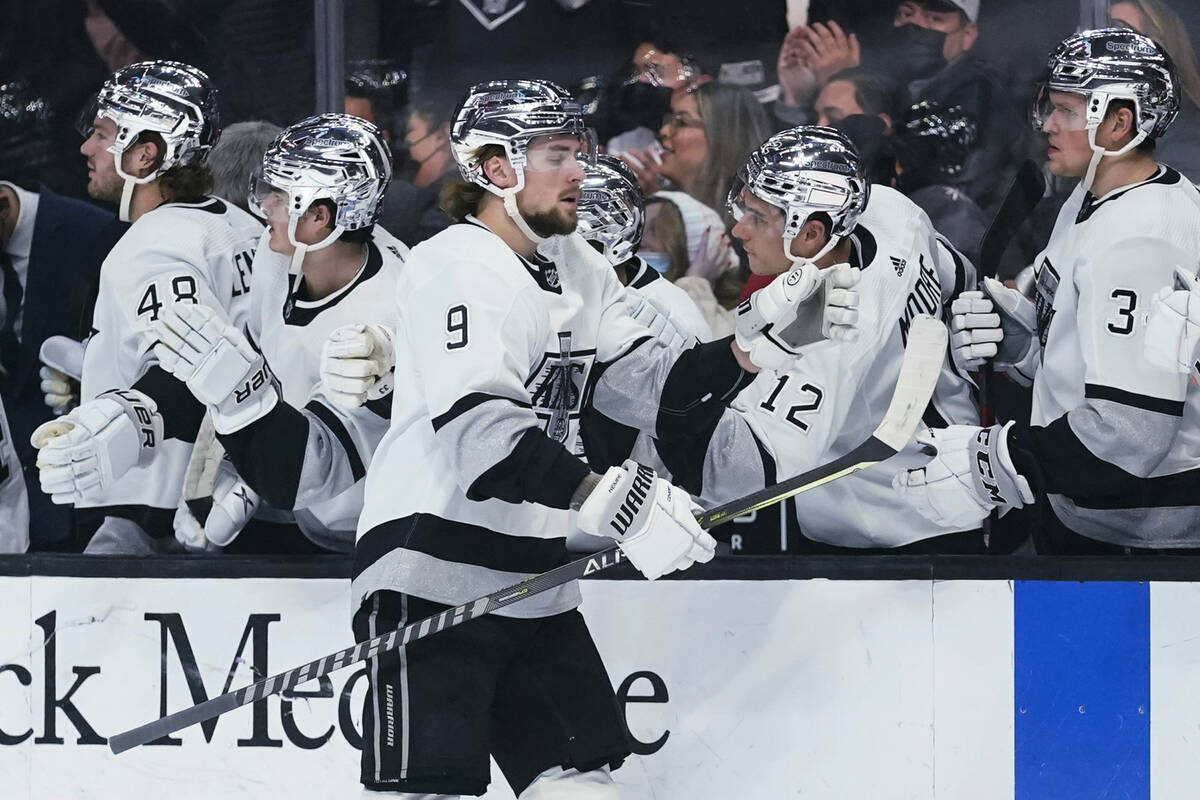 Los Angeles Kings center Adrian Kempe (9) is congratulated after scoring during the first perio ...