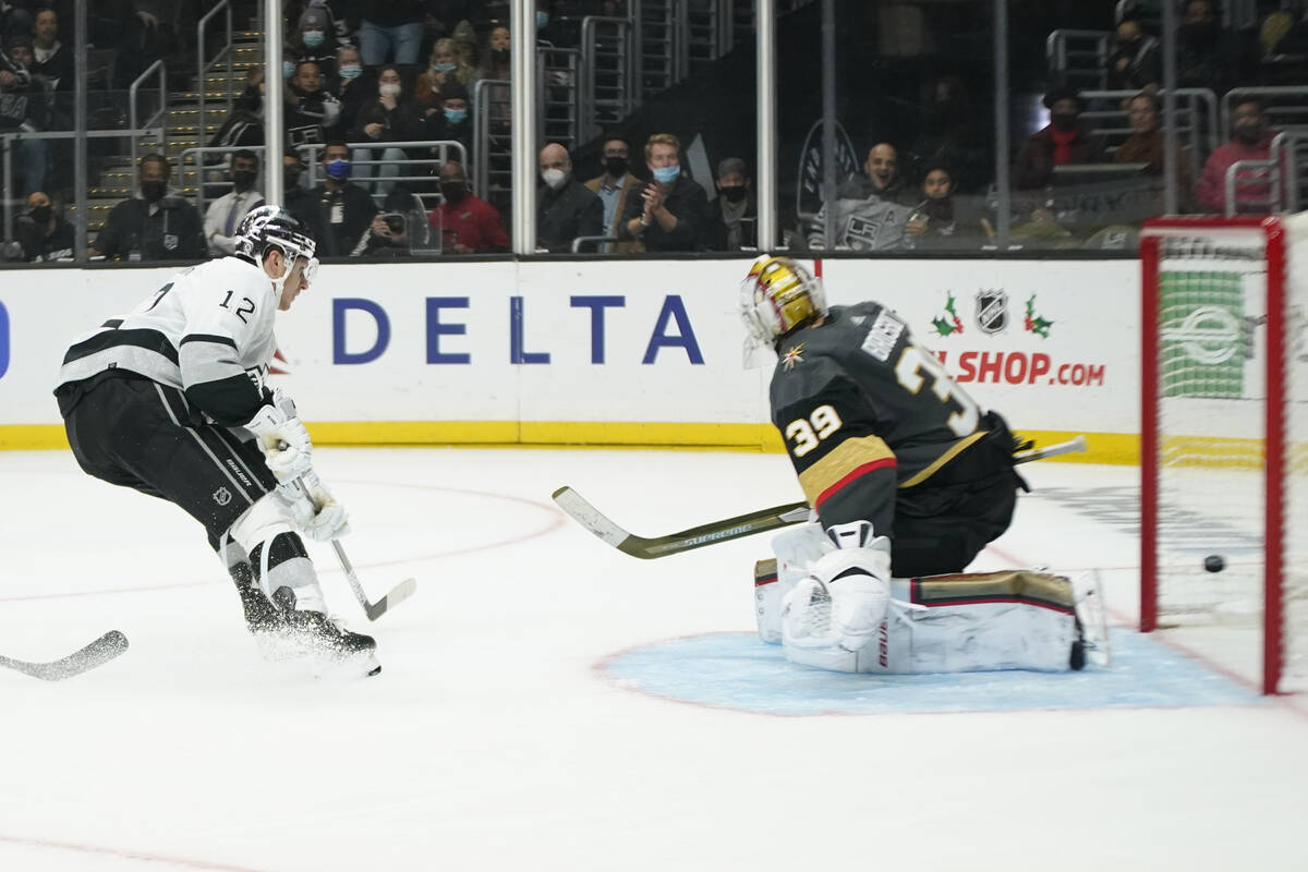 Los Angeles Kings center Trevor Moore (12) scores a goal during the second period of an NHL hoc ...
