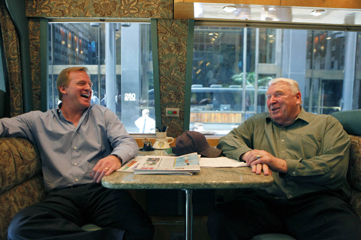 NFL commissioner Roger Goodell, left, and Pro Football Hall of Fame coach John Madden leave th ...