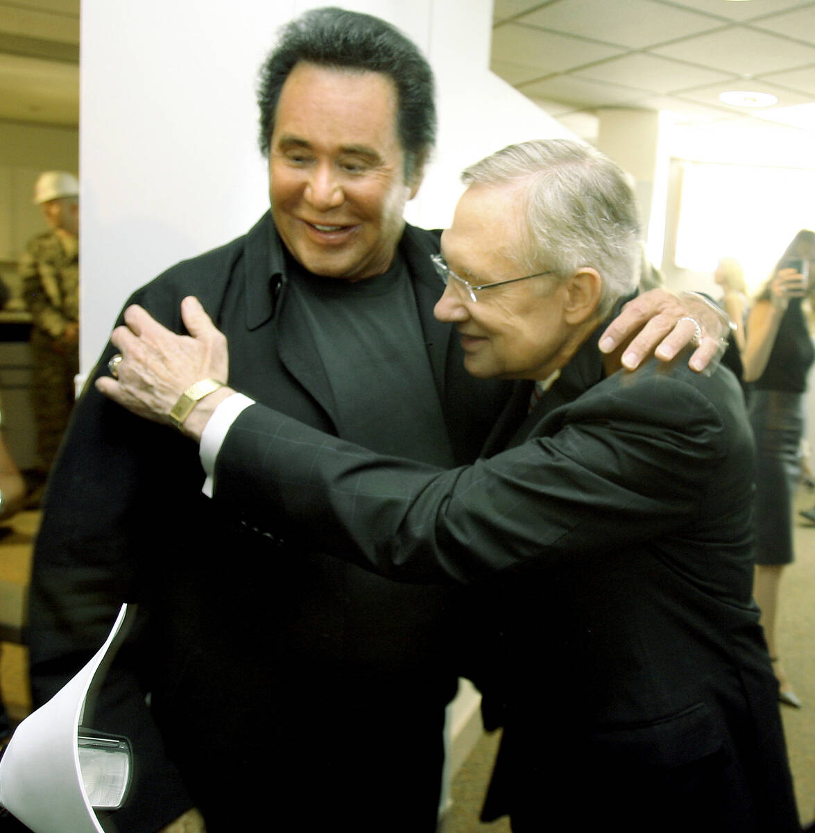 Entertainer Wayne Newton, left, greets U.S. Senator Harry Reid, D-Nev., during a groundbreaking ...