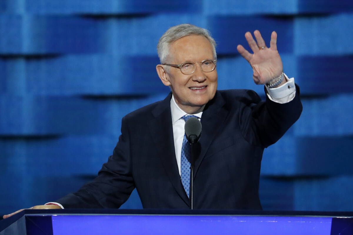 U.S. Senator Harry Reid, D-Nev., waves from the podium during the 3rd  time  of the Democratic N ...