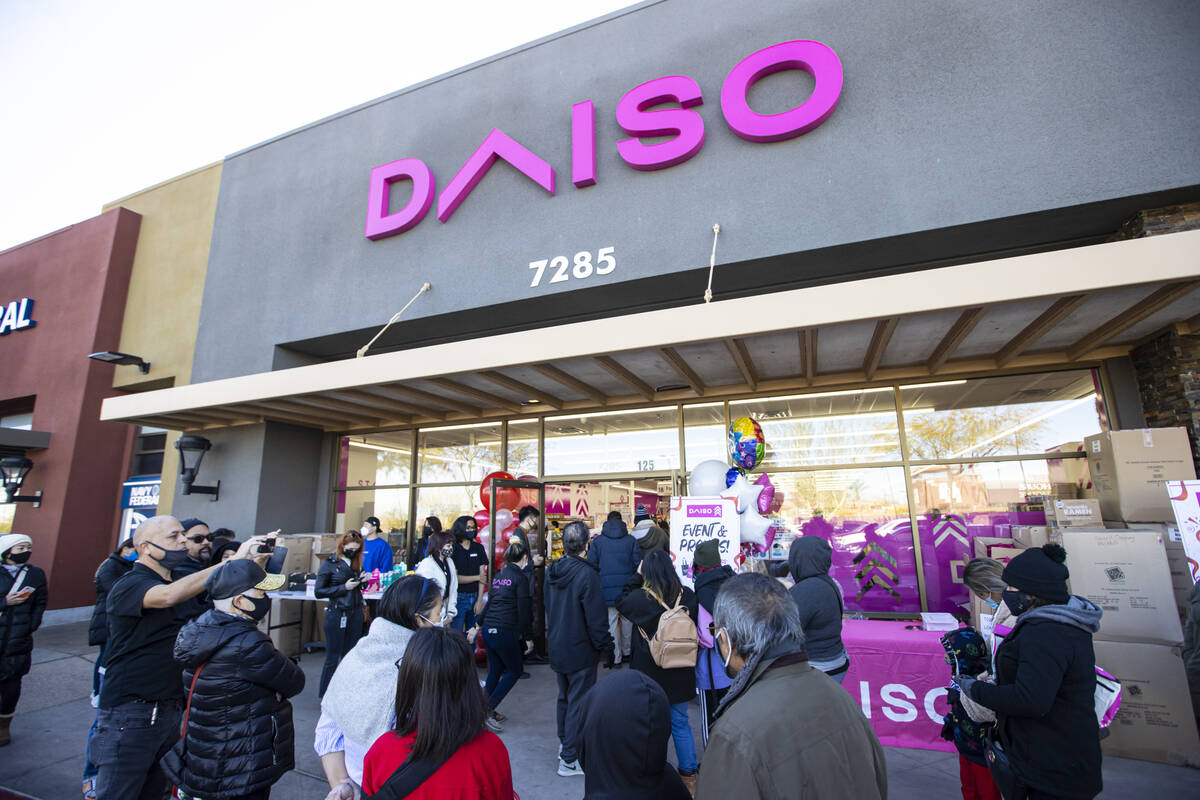 Customers enter Daiso, a popular Japanese discount store, during the grand opening on Wednesday ...