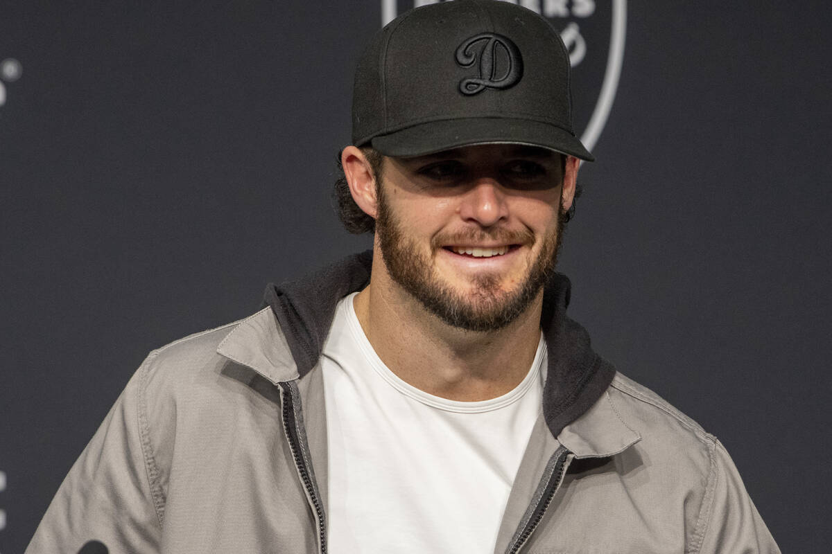 Raiders quarterback Derek Carr speaks with the media during a postgame news conference after th ...