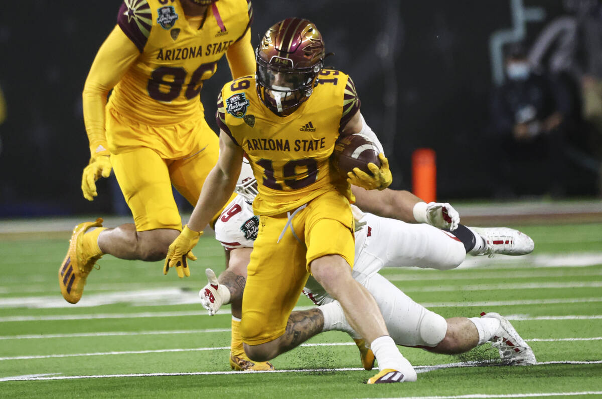 Arizona State Sun Devils wide receiver Ricky Pearsall (19) runs the ball against the Wisconsin ...