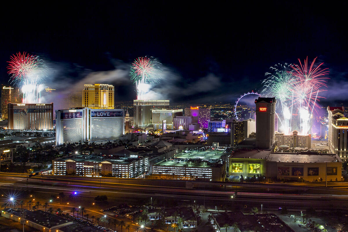 New Year's fireworks erupt over the Las Vegas Strip as viewed from the VooDoo Rooftop Nightclub ...