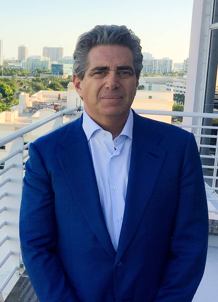 Developer Jeffrey Soffer, owner of Fontainebleau Development, poses for a photo on the balcony ...