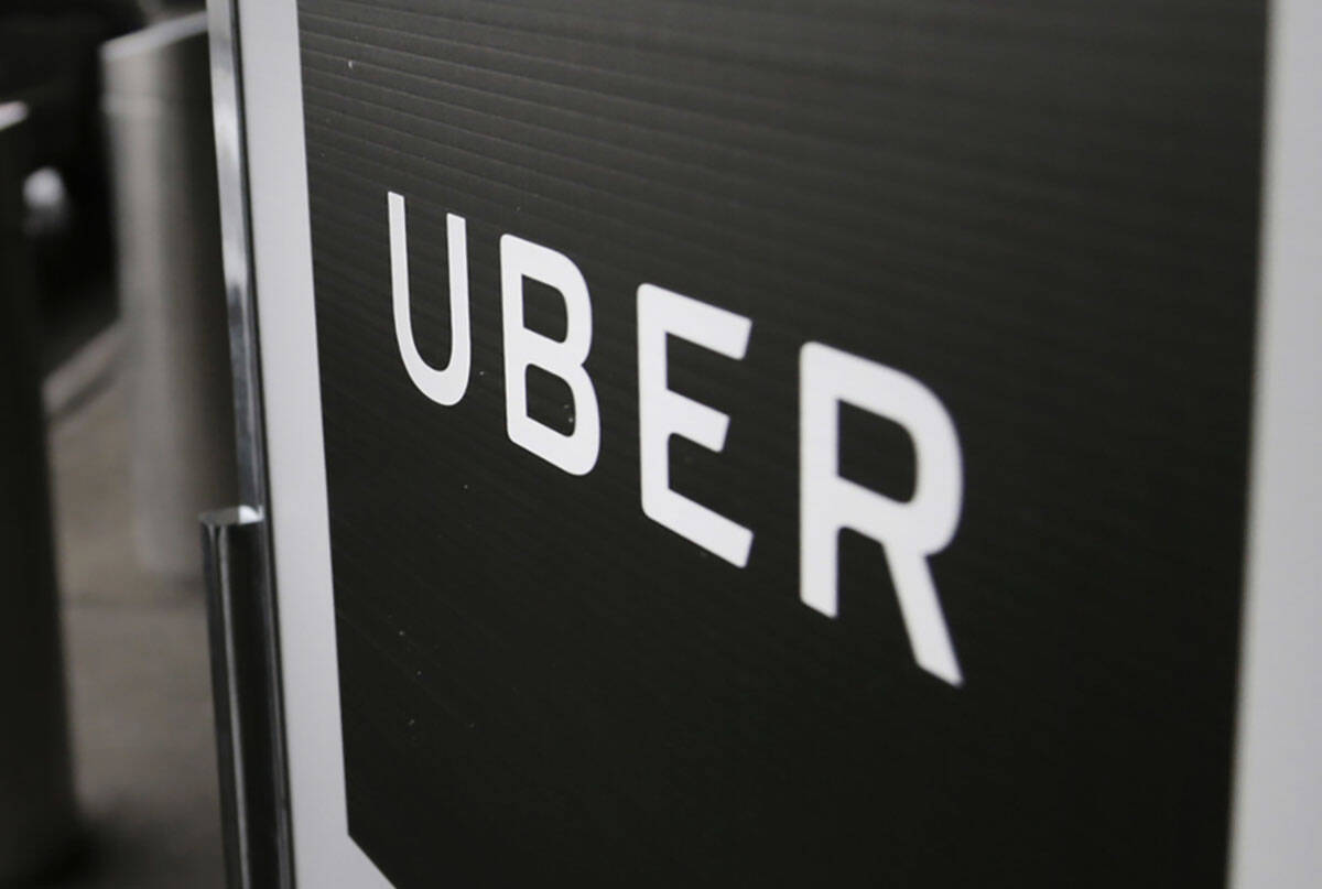 Uber is facing a class action lawsuit in Las Vegas. (Seth Wenig/AP)