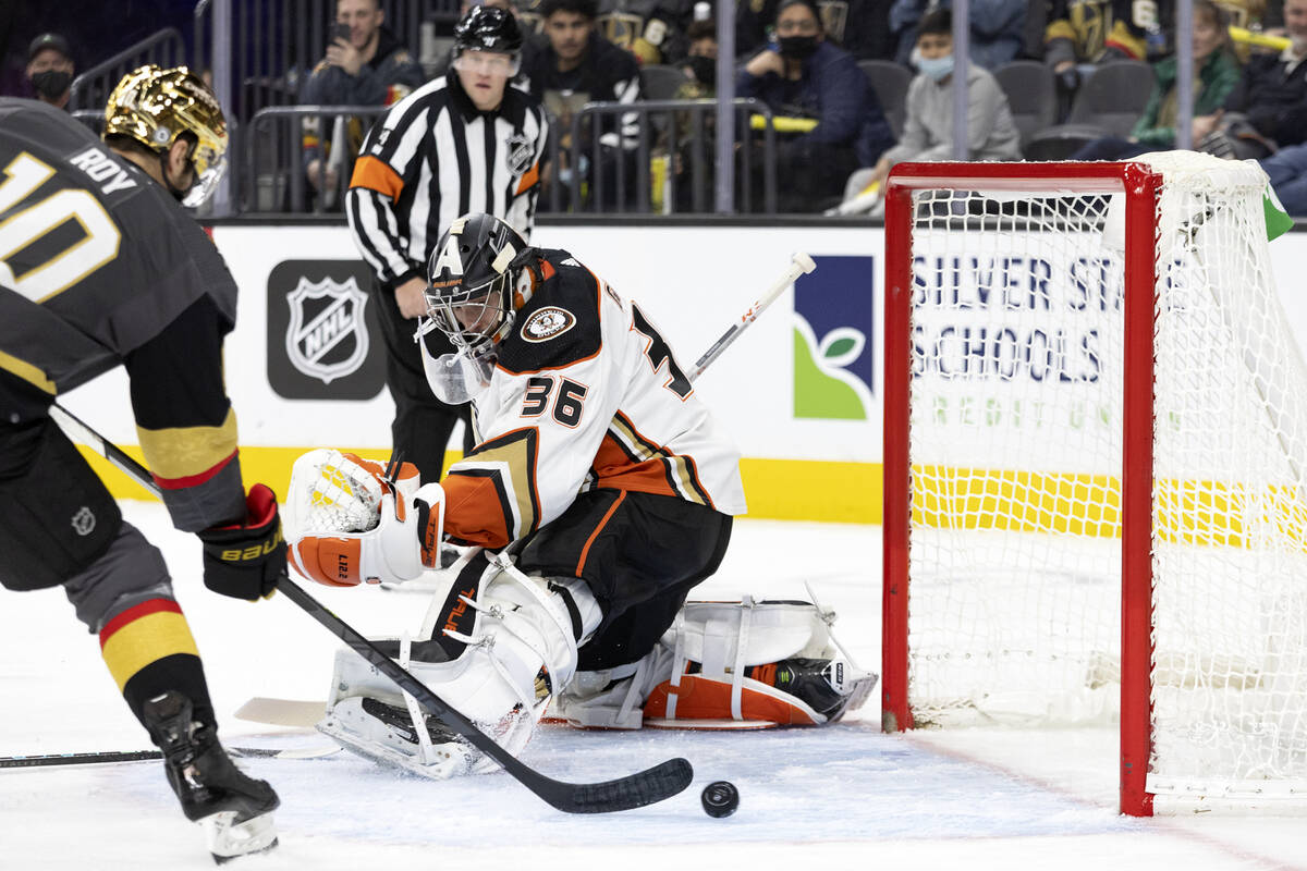 Golden Knights center Nicolas Roy (10) takes a shot on Ducks goaltender John Gibson (36) during ...