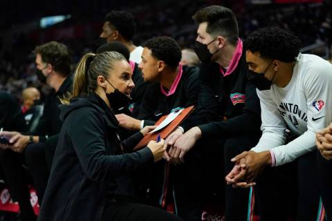 San Antonio Spurs assistant coach Becky Hammon talks with players on the bench during the first ...