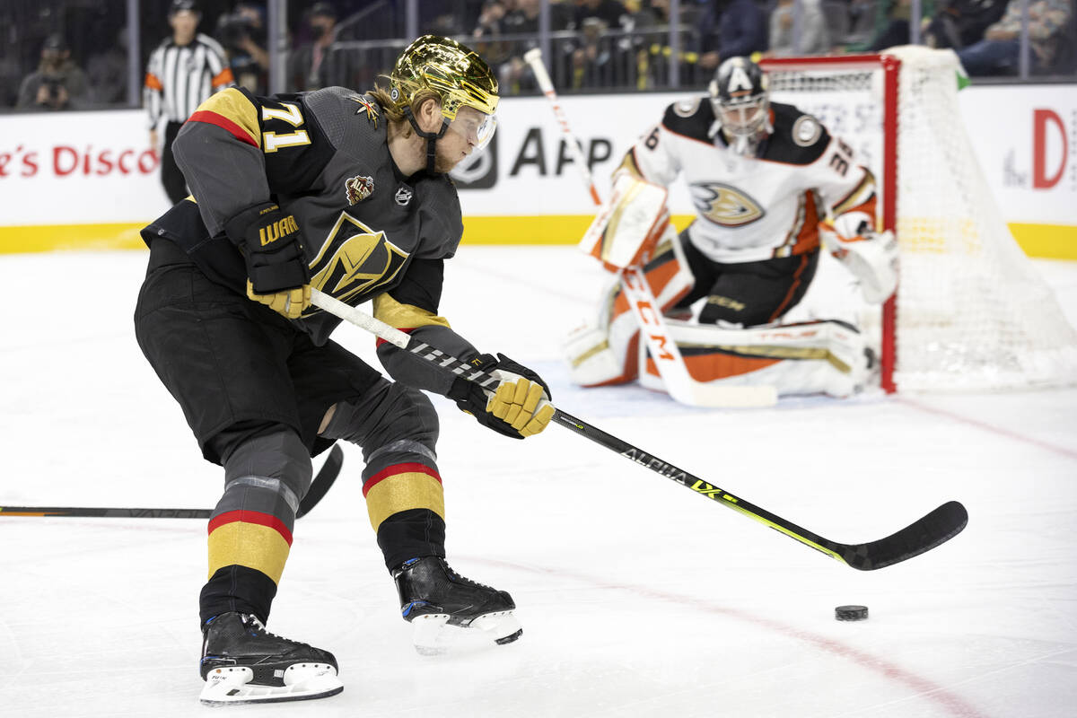 Golden Knights center William Karlsson (71) skates to take a shot on goal as Ducks goaltender J ...