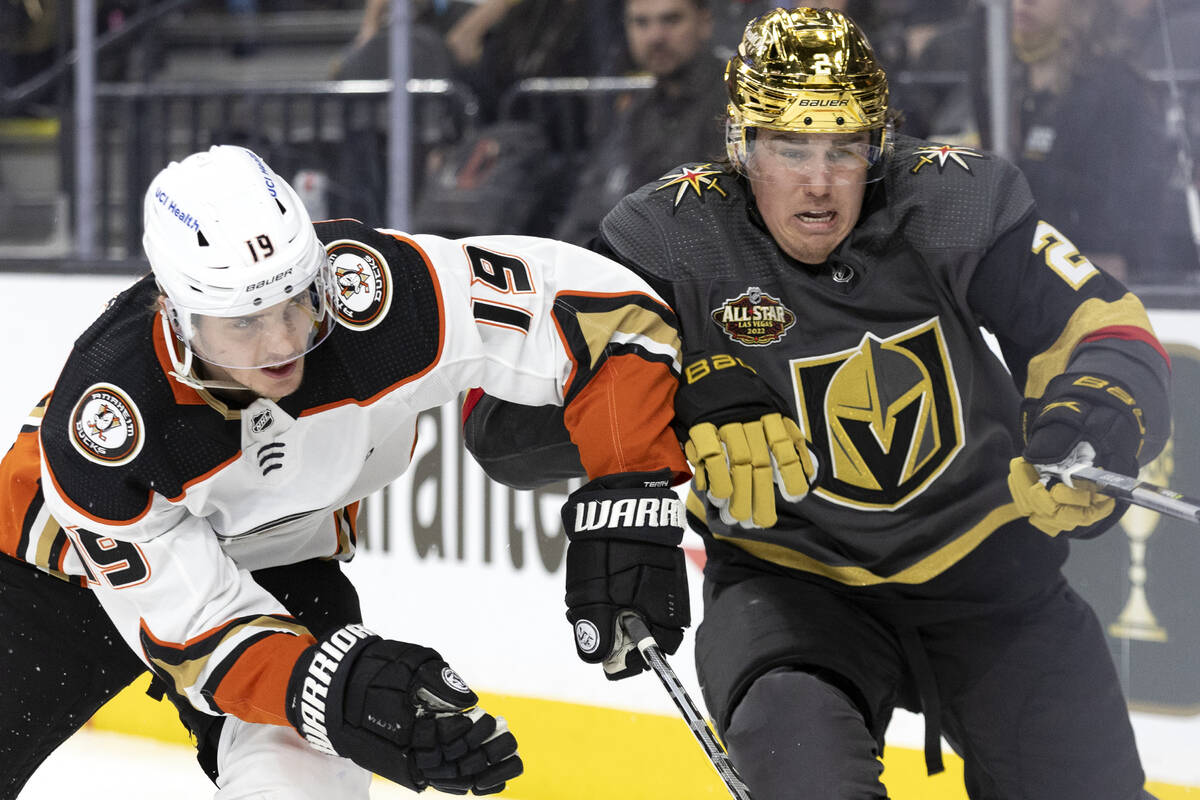 Ducks right wing Troy Terry (19) and Golden Knights defenseman Zach Whitecloud (2) collide whil ...