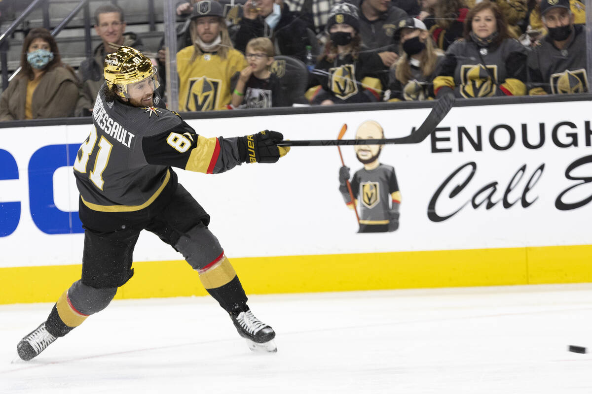 Golden Knights center Jonathan Marchessault (81) hits a slap shot against the Ducks during the ...