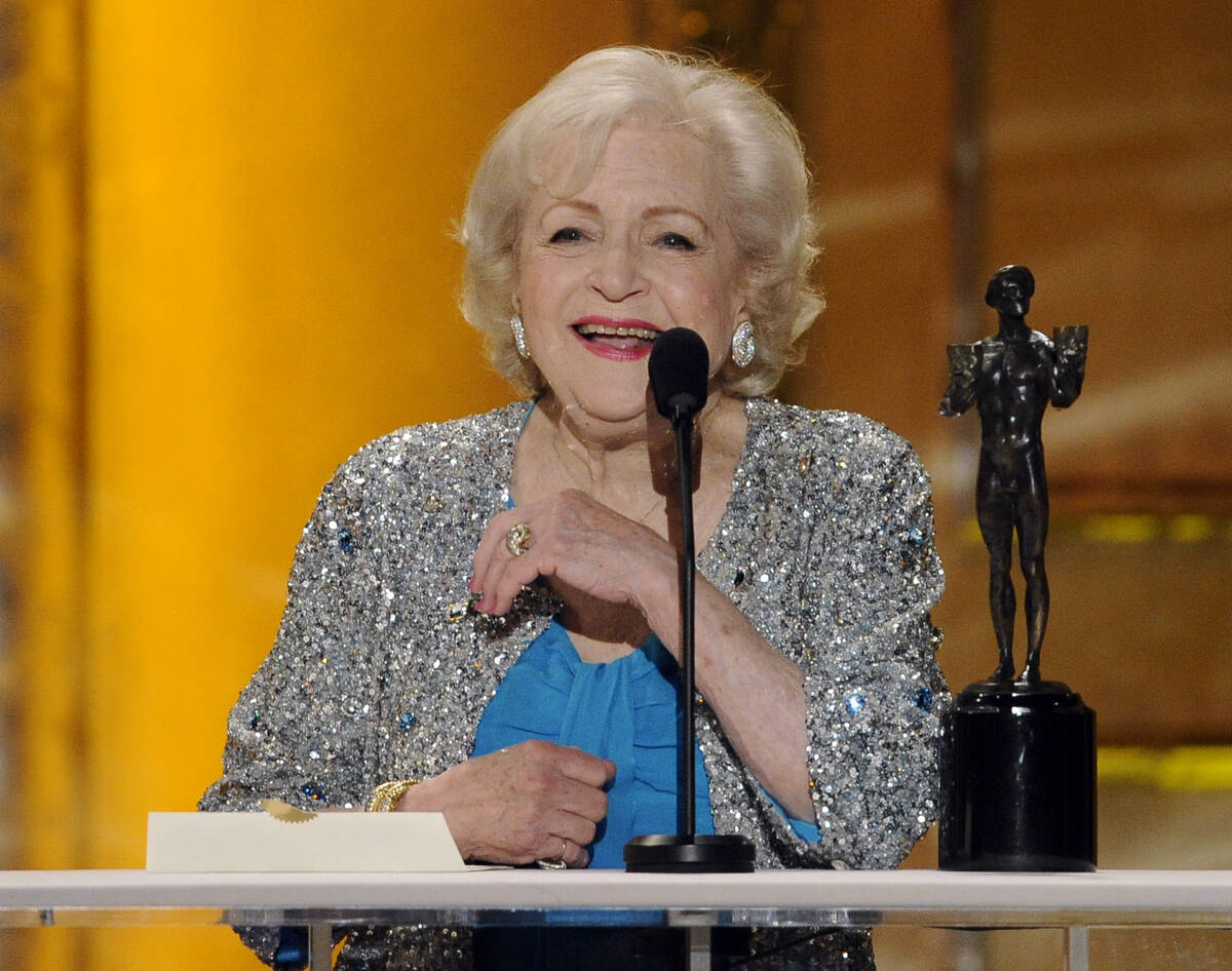 Betty White accepts the award for best female actor in a comedy series for "Hot in Clevela ...