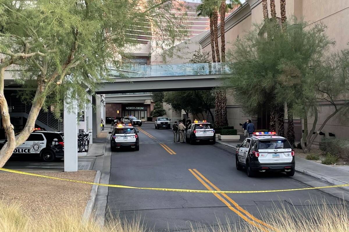 Police arrive at the parking garage at Fashion Show Mall in Las Vegas on Friday, Dec. 31, 2021. ...