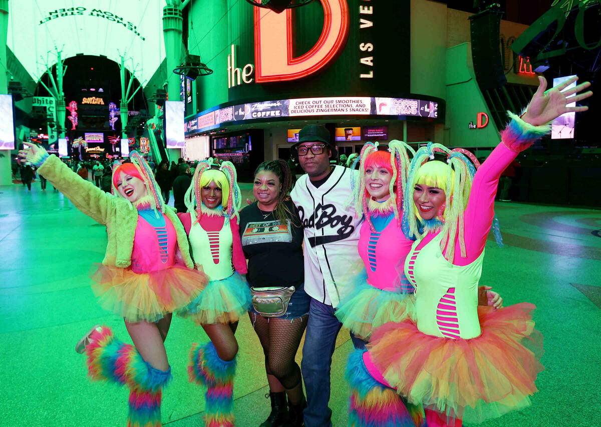 Derrick Westmoreland of Houston and Alisha McCord of Memphis, Tenn. pose with, from left, Melis ...