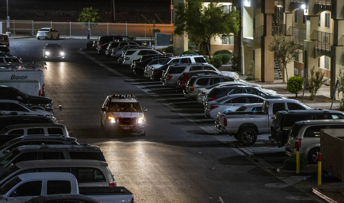 A Metro police vehicle cruises one of the parking lots at Siena Suites in October where Metro h ...