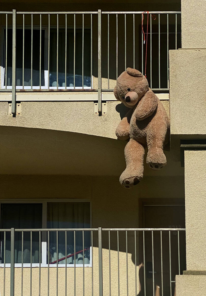 A giant Teddy Bear hangs from a balcony at one of the complexes within the Siena Suites where M ...