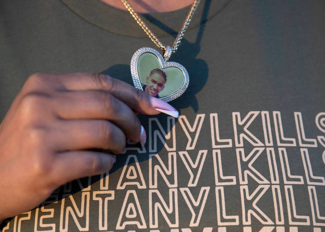 Cristina Perkins, mother of Giovanni Perkins, wears a shirt that reads #fentanylkills and a nec ...