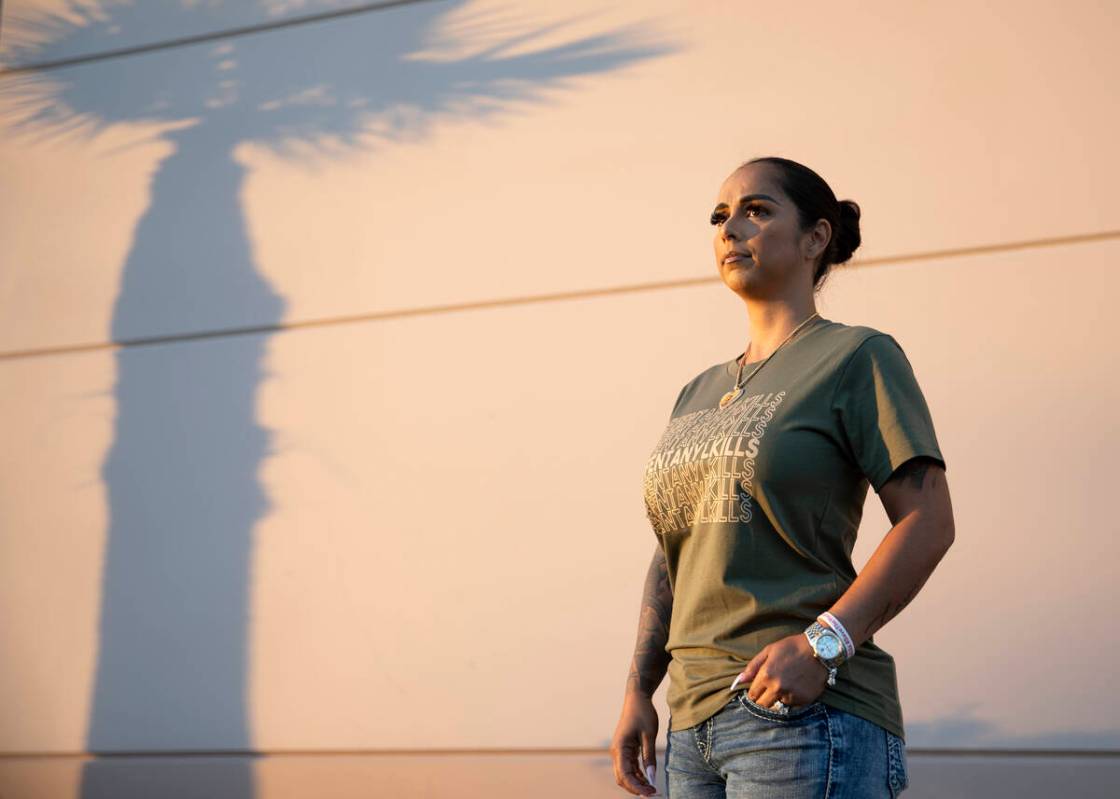 Cristina Perkins, mother of Giovanni Perkins, near a billboard she funded in honor of her son n ...