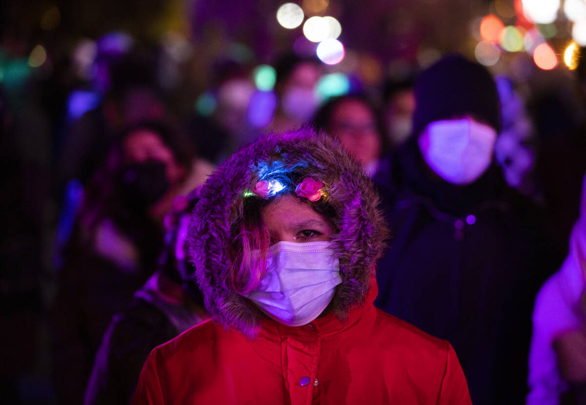 Large crowds fill the Strip on New Year’s Eve on Friday, Dec. 31, 2021, in Las Vegas.(Be ...