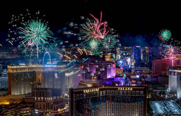 Fireworks explode over the Strip during New Year’s Eve celebrations on Saturday, Jan. 1, ...