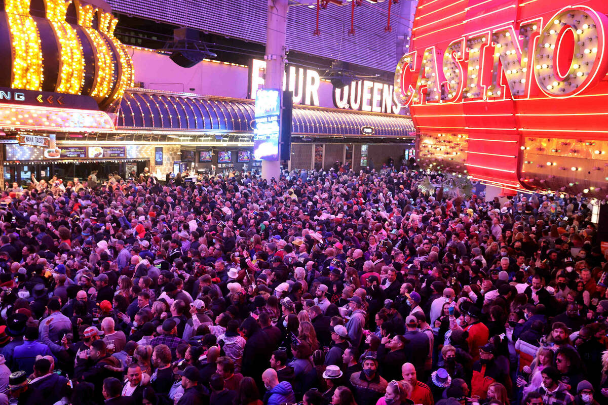 Revelers celebrate on New YearÕs Eve at the Fremont Street Experience in downtown Las Vega ...