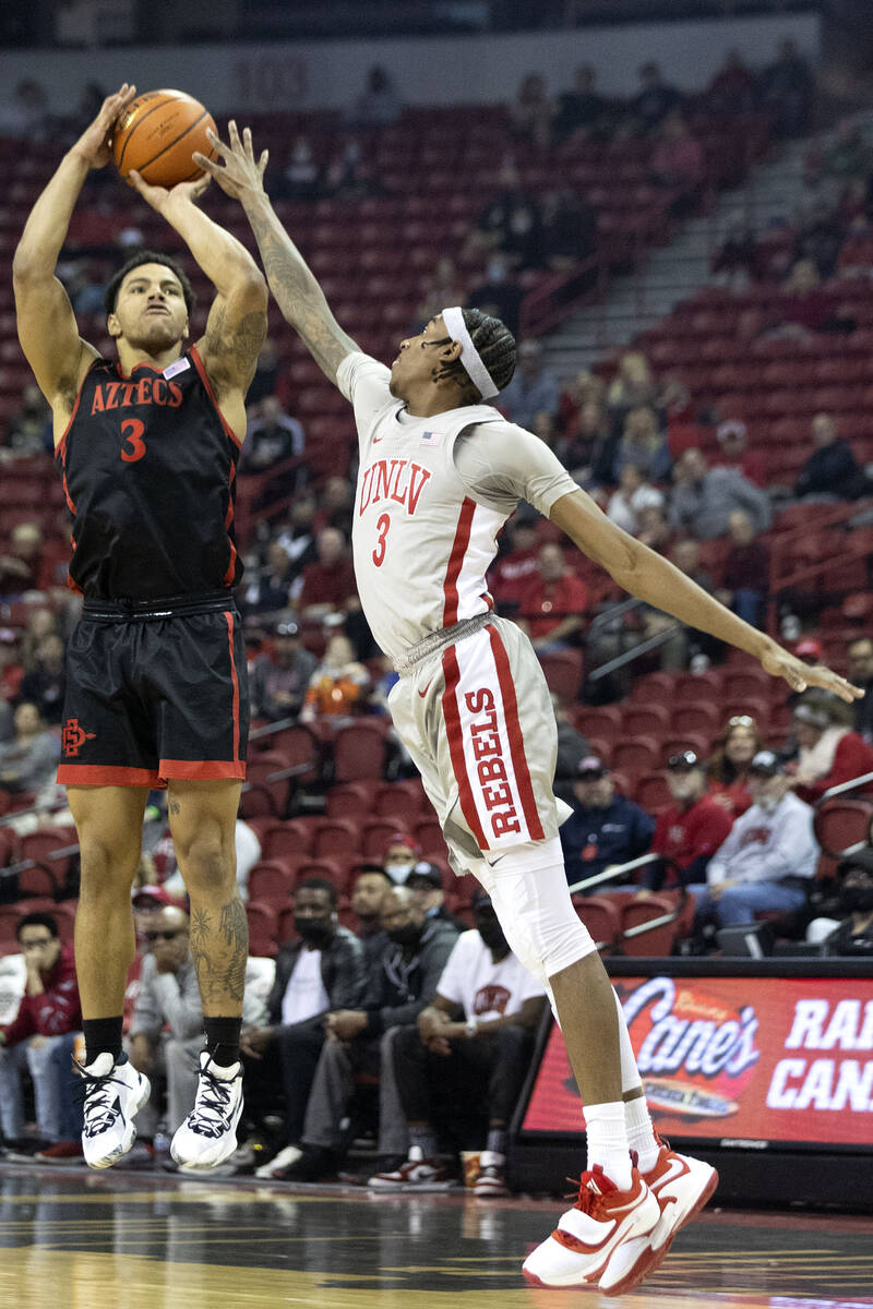 San Diego State Aztecs guard Matt Bradley (3) shoots against UNLV Rebels forward Donovan Willia ...