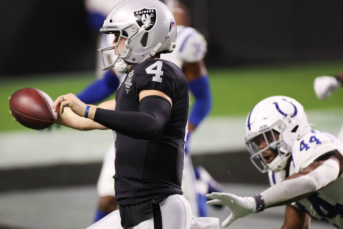 Raiders backmost   Derek Carr (4) runs for a touchdown against the Indianapolis Colts successful  the f ...