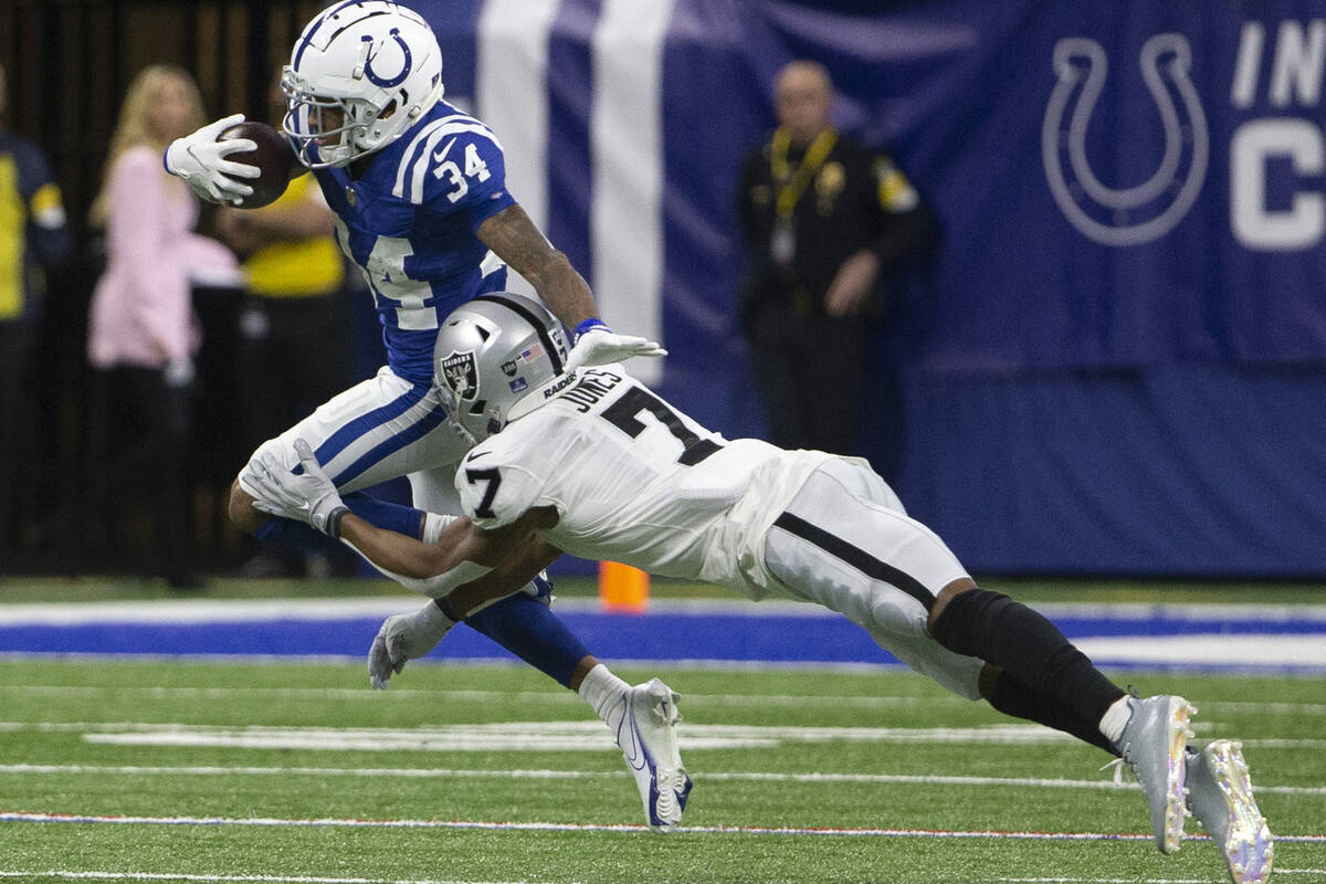 Indianapolis Colts cornerback Isaiah Rodgers (34) runs backmost  an interception arsenic  Raiders wide   rec ...