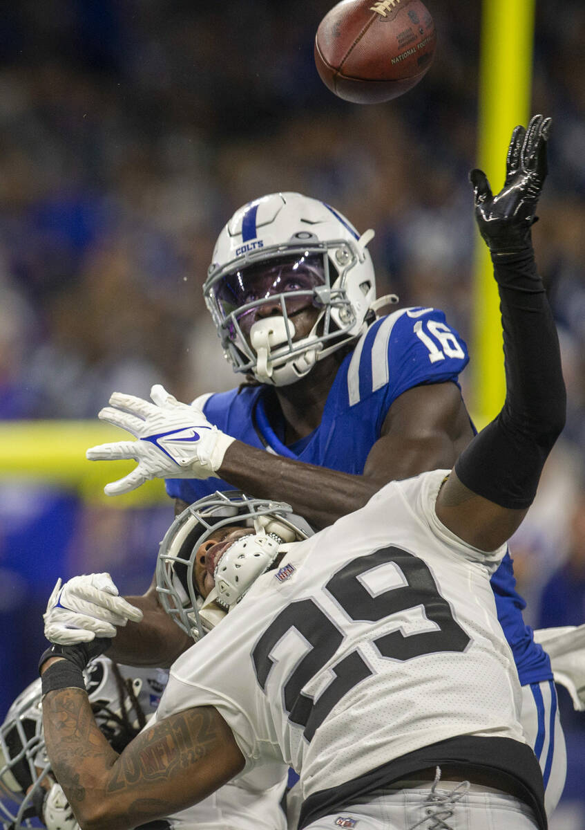 Raiders cornerback Casey Hayward (29) goes up to defend a pass that was intended for Indianapol ...