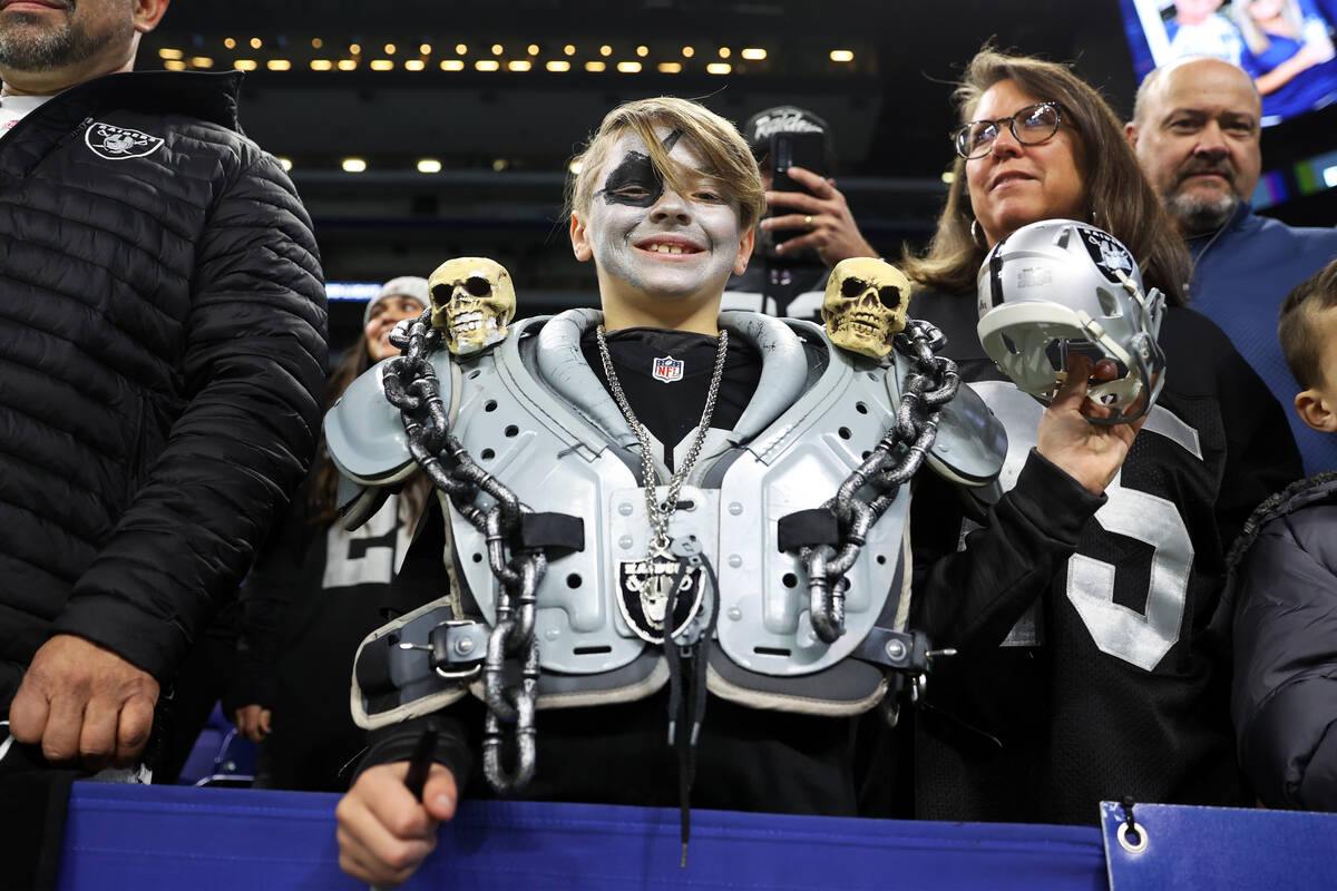 Mack Koch, 10, of Illinois, attends an NFL shot   crippled  betwixt  the Raiders and the Indianapol ...