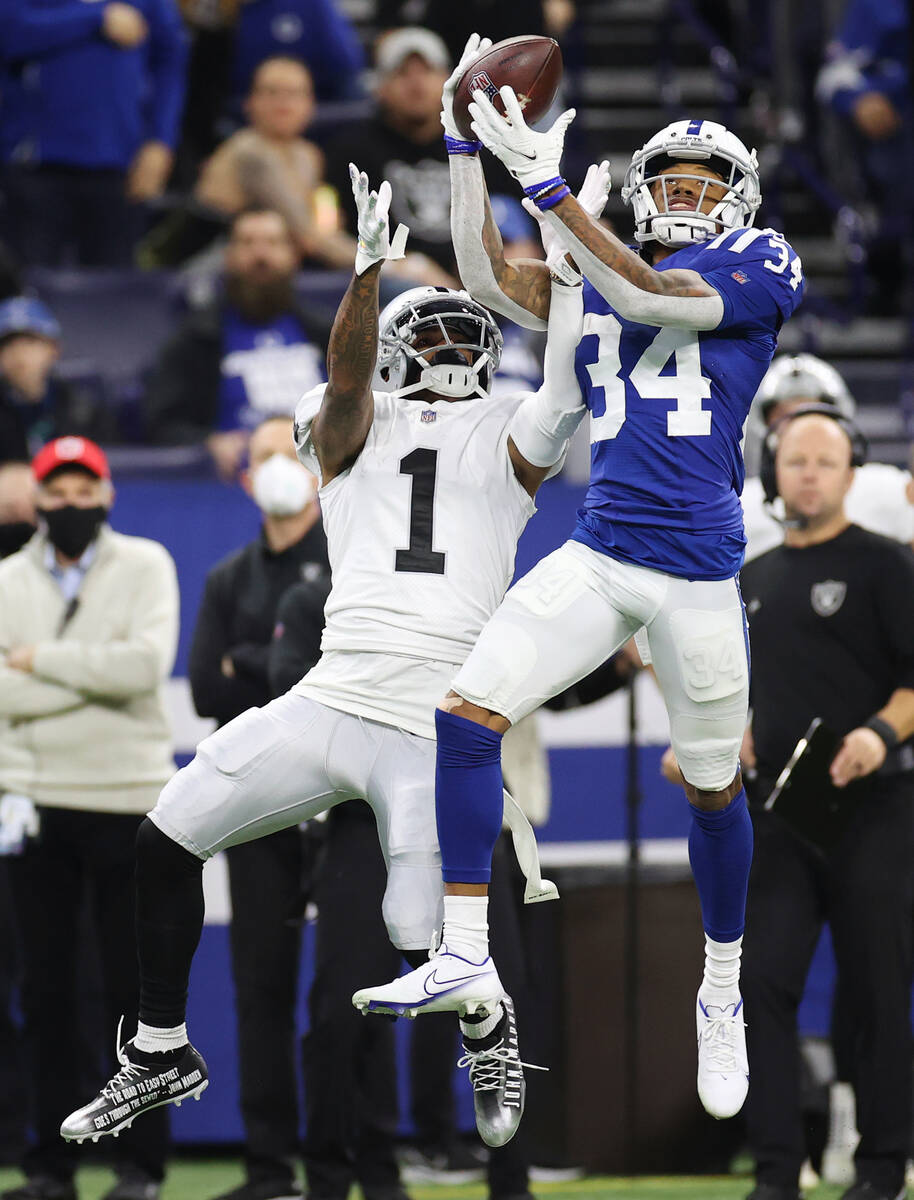 Indianapolis Colts cornerback Isaiah Rodgers (34) intercepts a shot  intended for Raiders wide   r ...