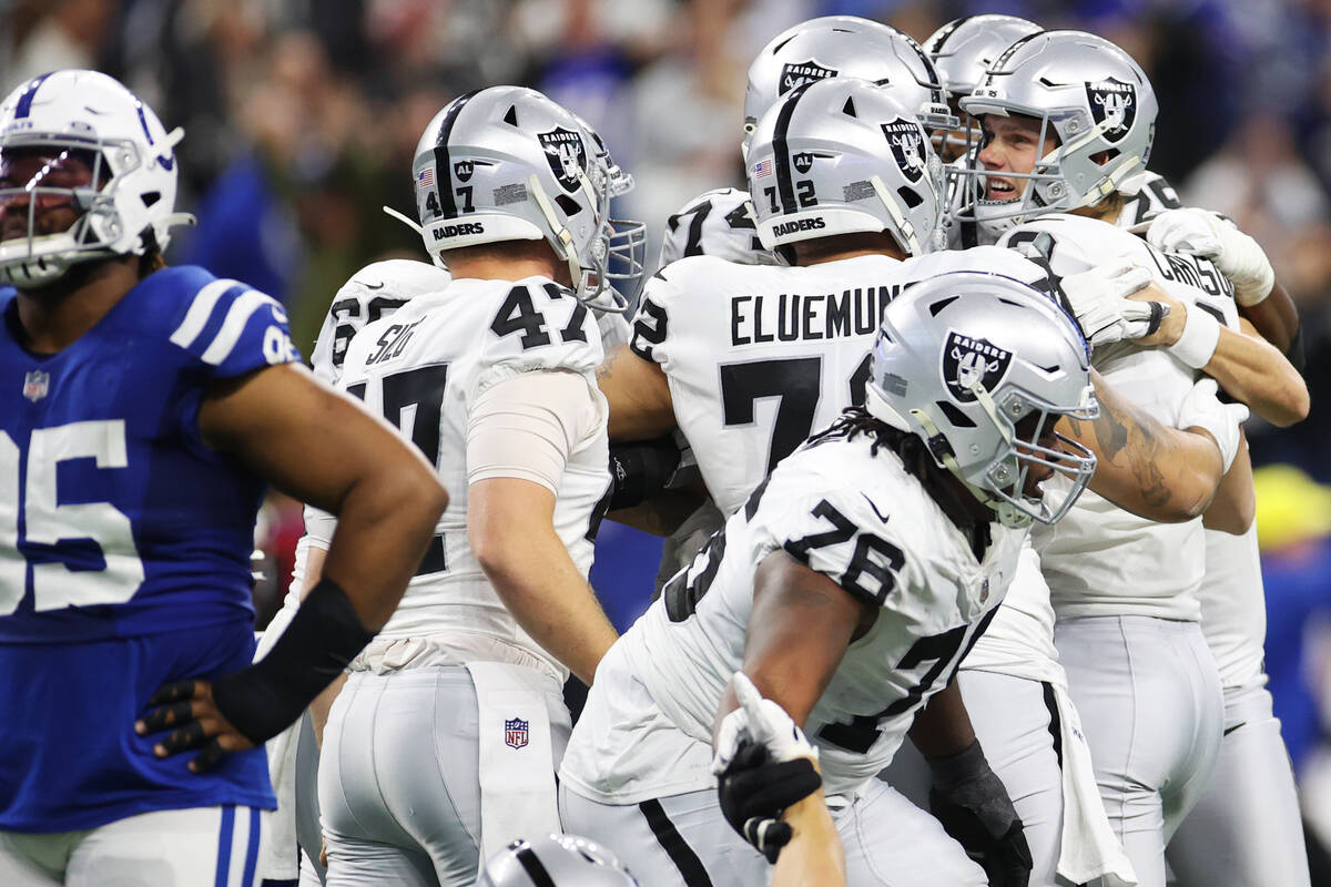 Raiders kicker Daniel Carlson (2) celebrates with his team after scoring a game wining field go ...