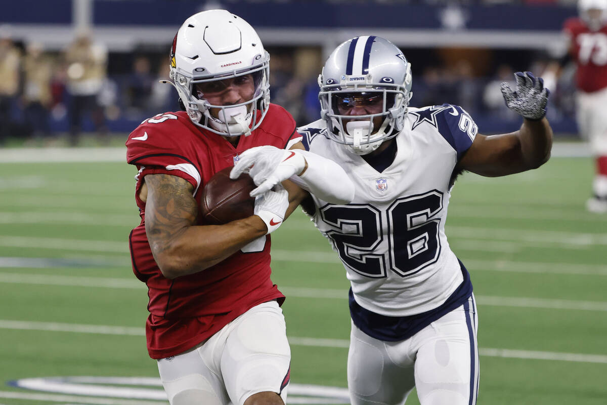 Arizona Cardinals wide receiver Christian Kirk (13) catches a pass for a first down as Dallas C ...