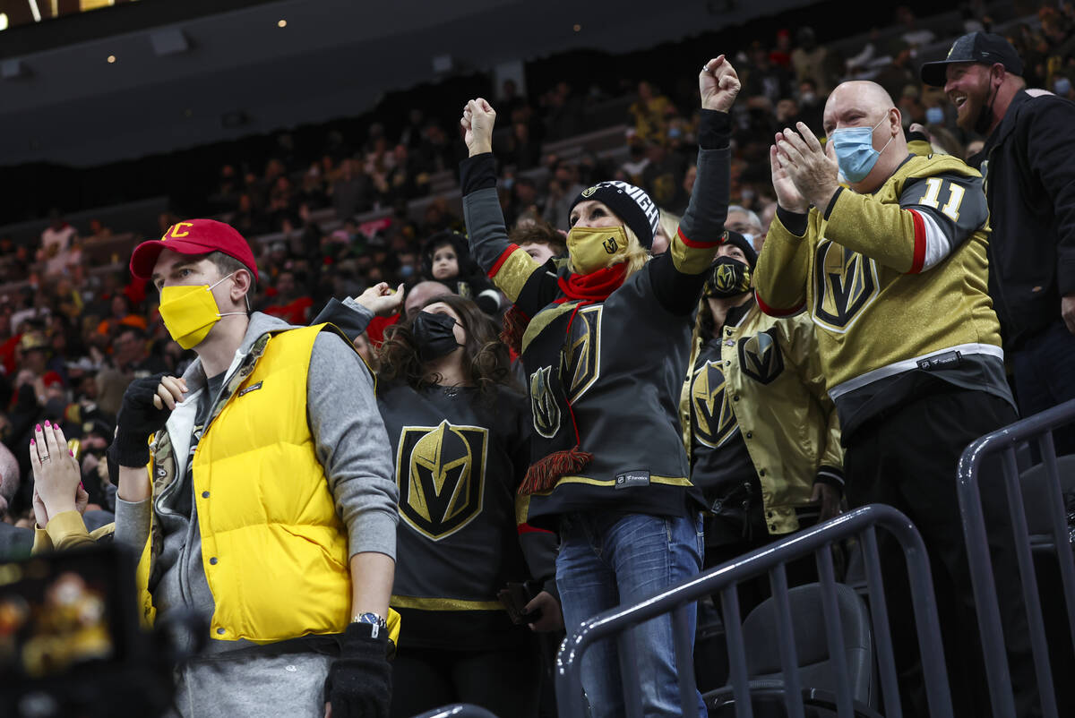 Golden Knights fans celebrate a goal by center Michael Amadio, not pictured, during the first p ...
