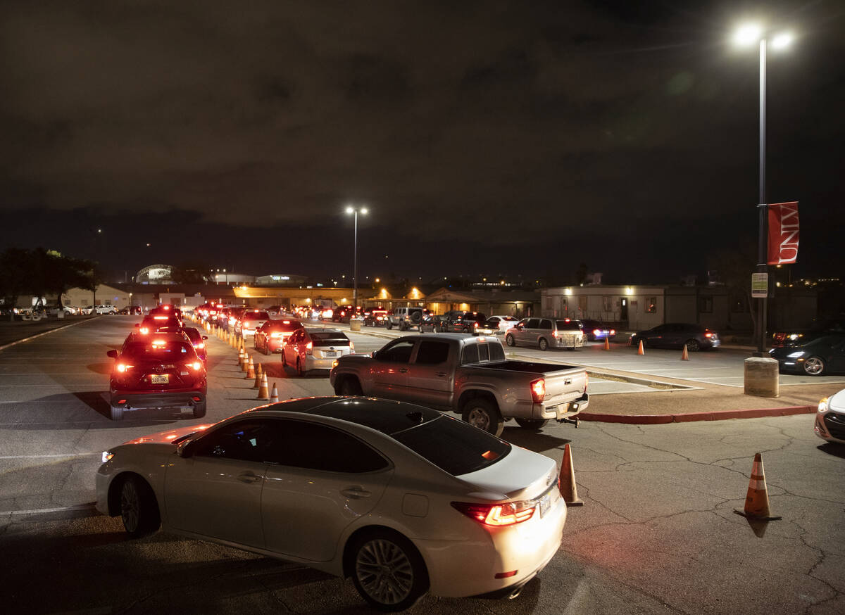 Traffic is backed up for blocks at a drive-thru and walk-up COVID-19 testing site at UNLV Parad ...