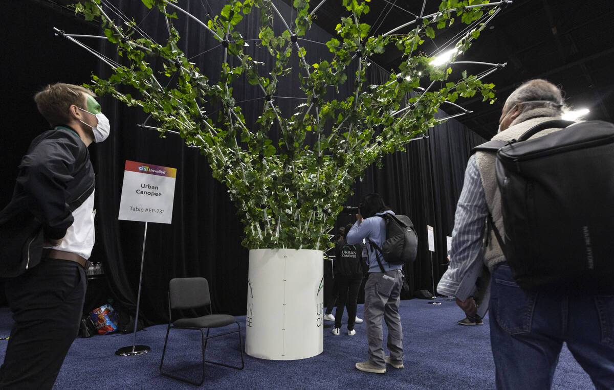 Attendees check out the Urban Canopy display at the the CES Unveiled event at the Mandalay Bay ...