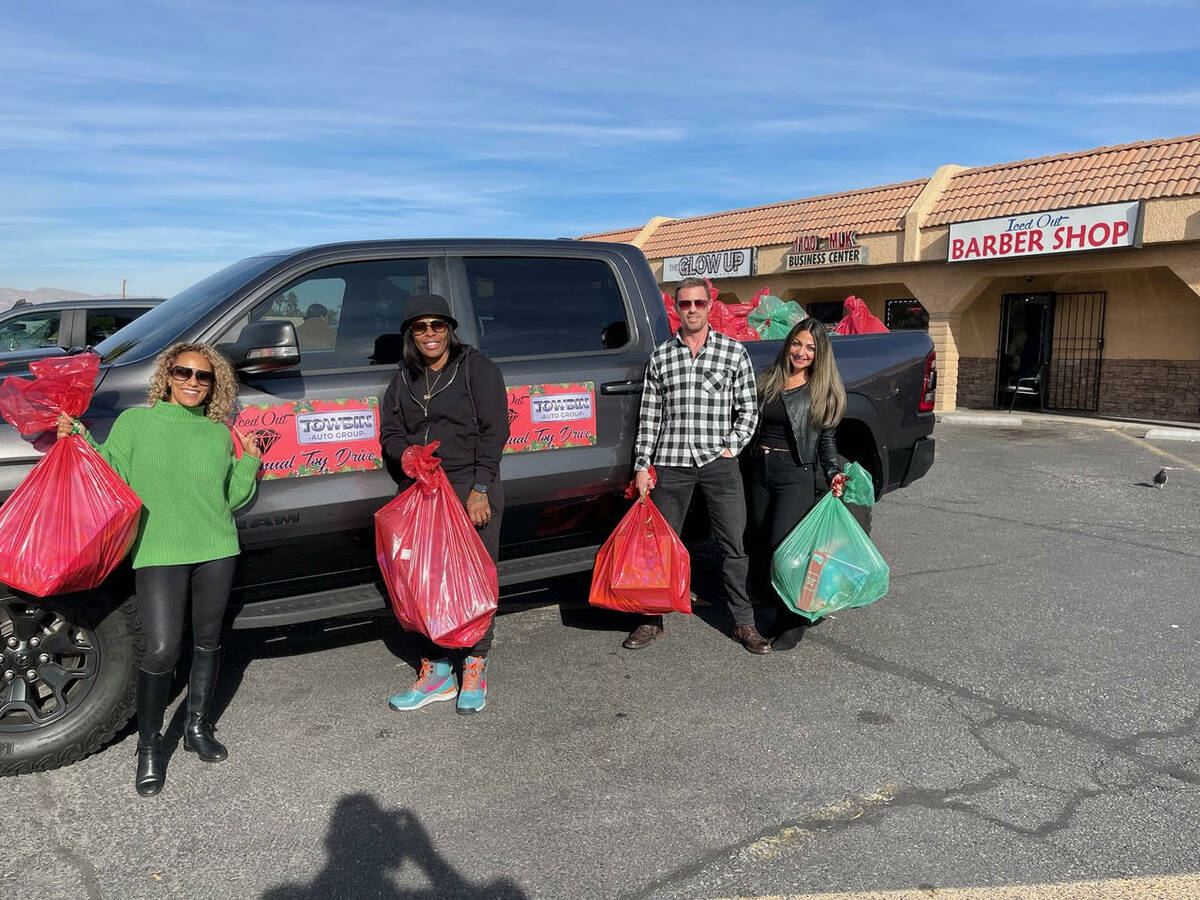 Towbin "elves" deliver toys and essentials items to help those less fortunate. (Towbin Auto Group)