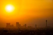 The sun shines through smoke and haze over the north end of the Las Vegas Strip on Monday, Sept ...
